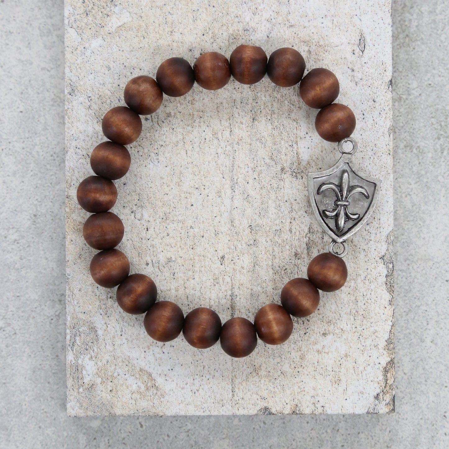 Bodhi Seed Elastic Bracelet with Silver Fleur De Lys Shield Charm