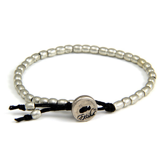 Tiny Barrel Bead Bracelet on Black Waxed Linen