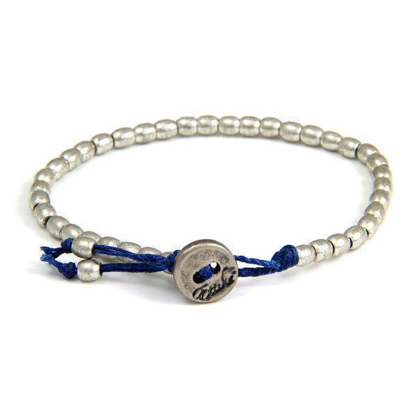 Tiny Barrel Bead Bracelet on Blue Waxed Linen