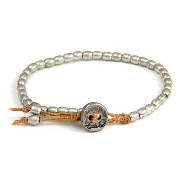 Tiny Barrel Bead Bracelet on Butter Scotch Waxed Linen