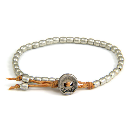 Tiny Barrel Bead Bracelet on Butter Scotch Waxed Linen
