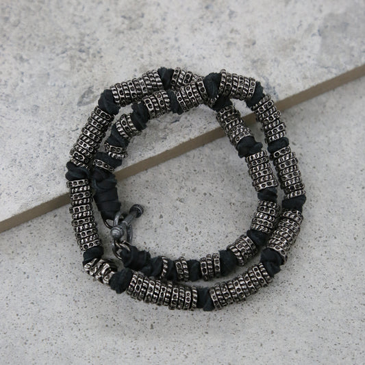 Black Leather and Silver Colored Donut Beads Wrap Around Bracelet