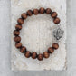 Bodhi Seed Elastic Bracelet with Silver Fleur De Lys Shield Charm