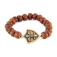 Bodhi Seed Elastic Bracelet with Silver Fleur De Lys Shield Charm