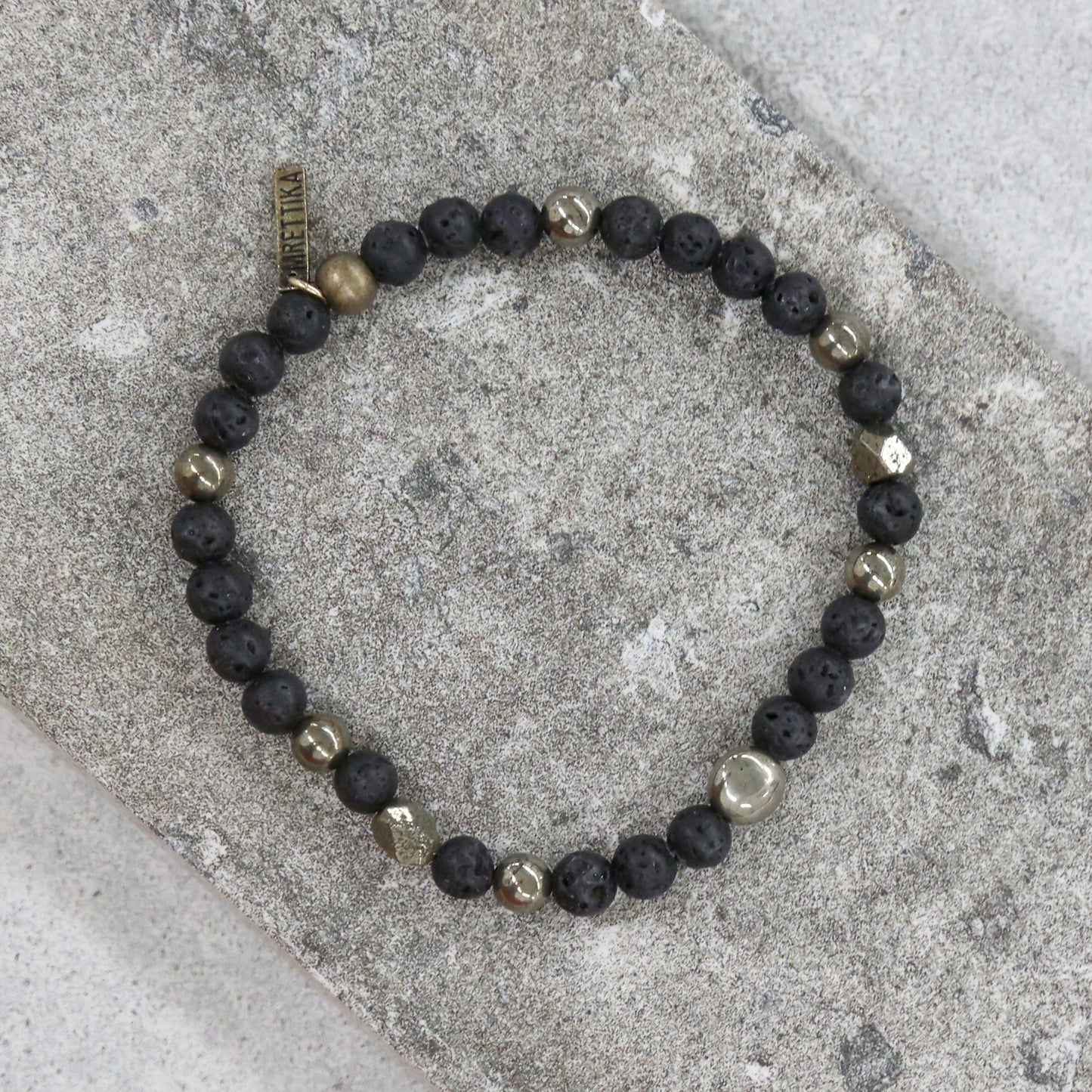 Igneous Bracelet in Lava Bead, Pyrite, and Brass